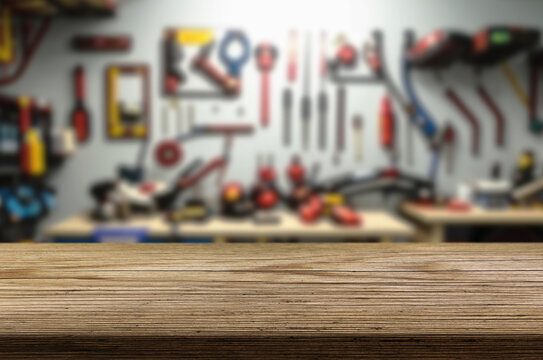 Blur craft workshop interior and empty wooden table top with space for products.