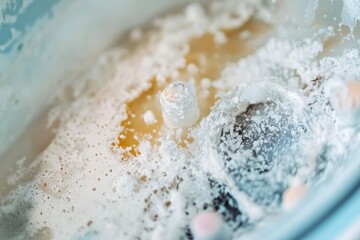 Close up of a grimy washing machine detergent drawer with mold
