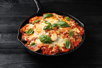 Traditional homemade Aubergine parmigiana with tomato sauce parmesan and mozzarella cheese