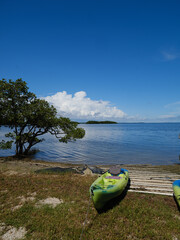 Green Ocean style Kayak sits on a boat ramp at the Biscayne Bay National Park boat ramp
