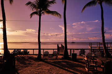 Looking out from a adirondack chair onto the Gulf of Mexico on Key Largo Florida at sunset