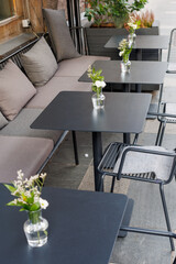 Outdoor cafe. Empty tables and chairs in the restaurant.