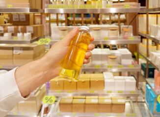 buying make up at cosmetics section in store