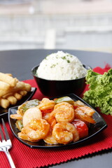 Gourmet Seafood Dish with Premium Flavors and Garnishes