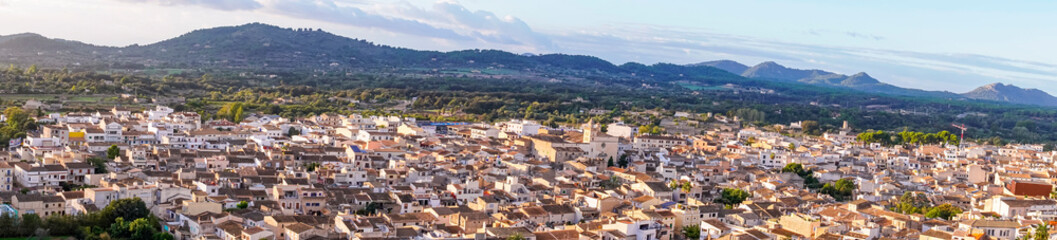 Aerial panoramic view of the Mallorcan town of Arta, on the island of Mallorca at sunrise. Spain