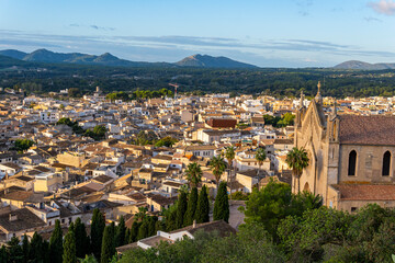 Obraz premium Aerial view of the Mallorcan town of Arta, on the island of Mallorca at sunrise. Spain