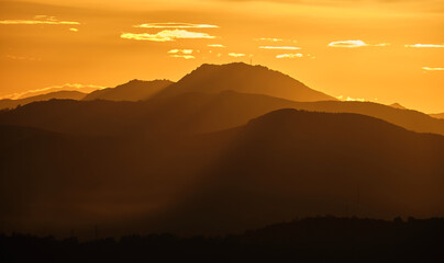 sunlight falling down the mountains