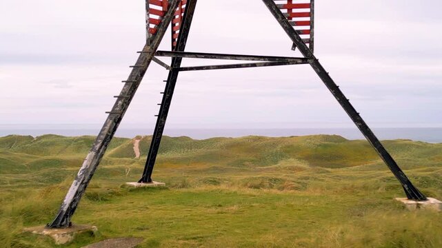 Drone shot of unlighted beacon seamark in the dunes of &Aring;rgab, on the west coast of Jutland, Denmark