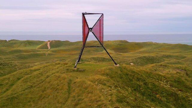 Drone shot of unlighted beacon seamark in the dunes of &Aring;rgab, on the west coast of Jutland, Denmark