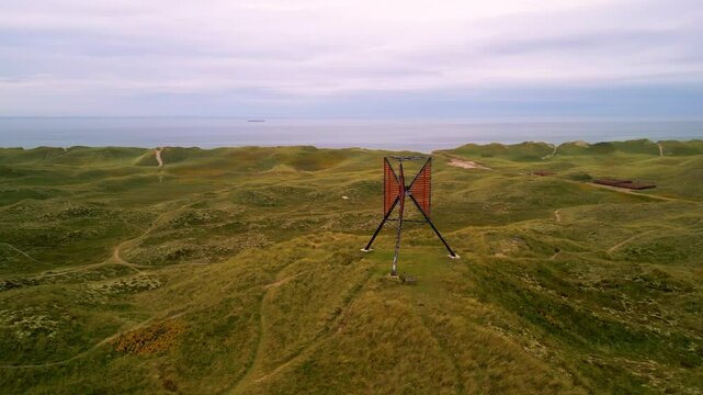 Drone shot of unlighted beacon seamark in the dunes of &Aring;rgab, on the west coast of Jutland, Denmark