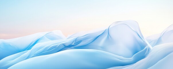 Obraz premium Serene winter landscape with soft, undulating snow drifts under a pale blue sky, evoking tranquility and peacefulness.