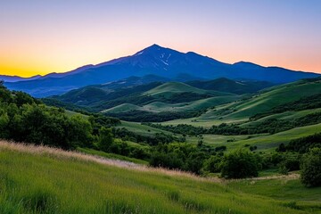 Obraz premium Minimalist mountain range silhouette against a pastel gradient sky at dawn