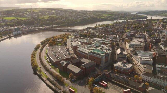 City of Derry aka Londonderry in Northern Ireland aerial view - A Beautiful Cityscape from above by the River Foyle Featuring the Beautiful Pedestrian Peace Bridge