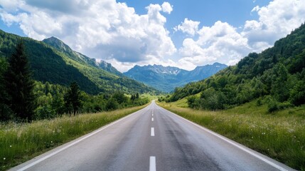 Fototapeta premium Asphalt Road Through Mountain Valley