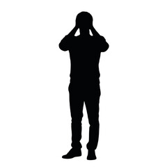 Obraz premium A silhouette of a person standing with their hands covering their face
