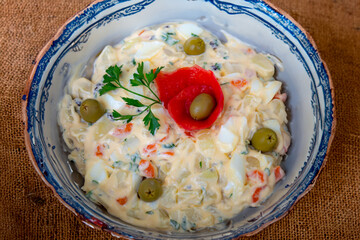 Traditional potato salad, rustic homemade mayonnaise