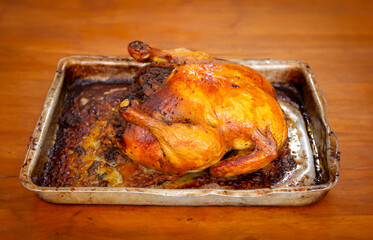 Rustic roast chicken stuffed with farofa