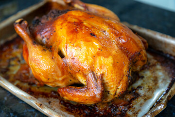 Rustic roast chicken stuffed with farofa