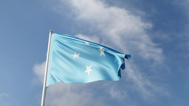 Flag of the federal state of micronesia on a blue sky, flag on a flag pole waving in the wind, oceania country, national symbol of Micronesia, video of a flag