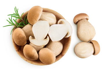 Fresh porcini cep mushroom in wooden bowl isolated on white background. Top view. Flat lay