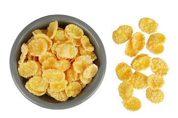 Cornflakes in ceramic bowl isolated on white background. Top view. Flat lay