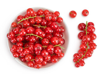 Red currant berries in a ceramic bowl isolated on white background. Top view. Flat lay