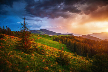 Dramatic overcast sky before a storm over a splendid mountain range. Carpathian mountains, Ukraine, Europe.
