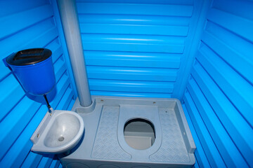 Interior portable toilet. Biotoilet with shell inside. Portable WC with floor-mounted toilet. Genoa...