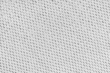 Texture of white jacquard fabric of diagonal rough weave cloth structure macro background