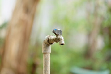 Tap water. close up detail of water tap with pipe pipe outdoors