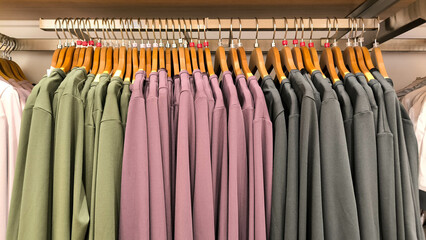 Clothes hanging in row on rack