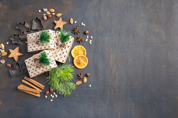 Christmas tree branches and Christmas wrapped gifts. Christmas and New Year.