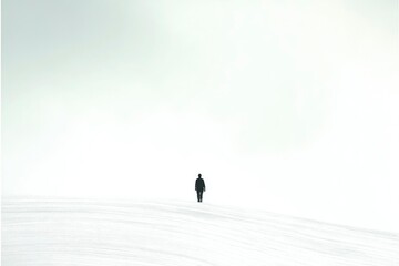 A Solitary Figure Walking on a White Landscape