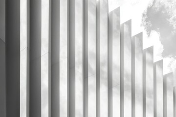 Abstract Architectural Detail of White Columns and Cloudy Sky