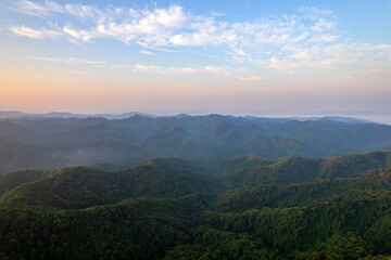 Beautiful aerial view of green forest and nature rainy season.