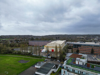 high Angle View of Buildings at Central Borehamwood London City of England United Kingdom. April 4th, 2024, Aerial View Was Captured with Drone's Camera From High altitude During Cloudy and Windy Day.