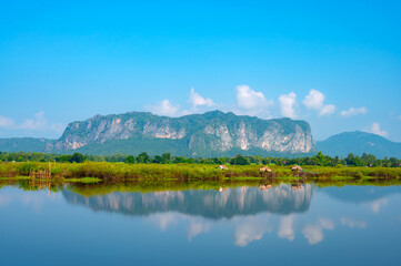 Phu Pha Man Mountain Khon Kaen Province Thailand, District Landmark Beautiful when exposed to the light of the morning sun , Aerial view from the drone with a beautiful sky background.rice field land.