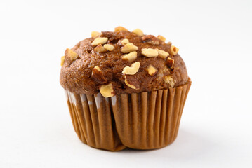 Chocolate almond muffin on white background