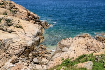 Rocky Shoreline Meets the Turquoise Sea