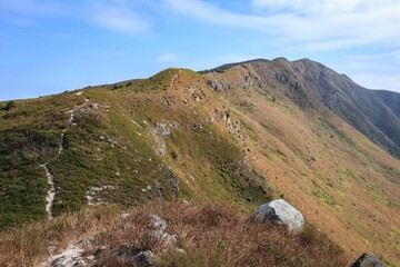 Scenic Mountain Ridge with Hiking Trail and Rocky Terrain
