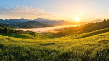 Naklejka premium Breathtaking sunrise breaking through morning fog over rolling hills, creating serene landscape.