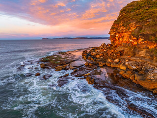 Winter seascape views over the beach with high and medium cloud cover