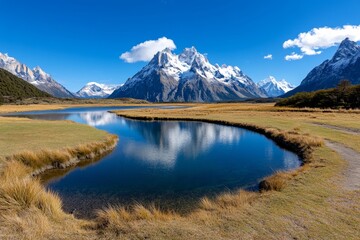 Golden light of dawn illuminating the Torres del Paine, casting long shadows over the valleys and creating a breathtaking view