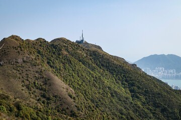 Scenic Mountain Landscape with Communication Tower and Lush Greenery
