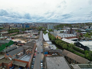 Fototapeta premium High Angle View of Historical Sheffield City Which is Located at English county of South Yorkshire United Kingdom. Aerial View of City Was Captured with Drone's Camera From High altitude on April 29th