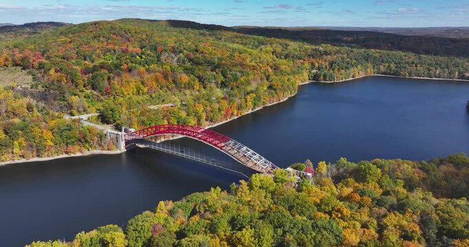 Late afternoon aerial autumn video of the area surrounding the Yorktown Heights, NY, USA and the the New Croton Reservoir.  10-16-2024