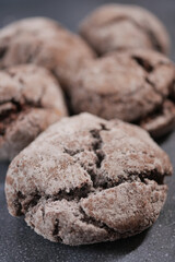 stack of chocolate cookies on table 