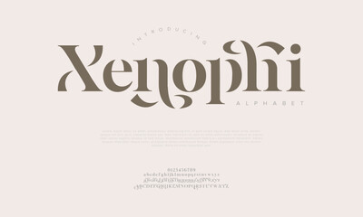 Xenophi typography beauty fashion elegant minimalist serif italic fonts decorative wedding vintage retro logos. Minimal luxury font alphabet logo. Vector illustration