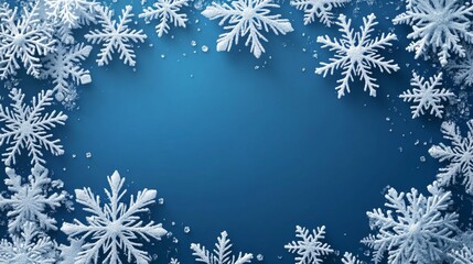 Snowflakes on a blue background, creating a winter-themed frame with beautiful white patterns.