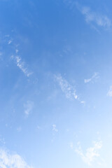 beautiful blue sky and white fluffy group of clouds with sunrise in the morning, natural background